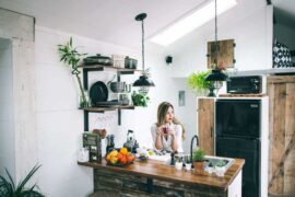 woman in kitchen - how to buy a green home