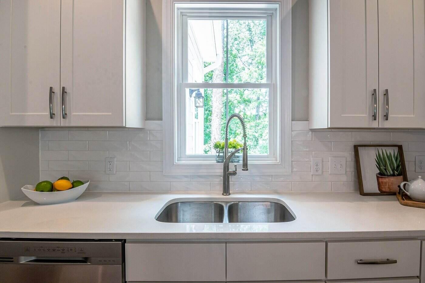 window flanked by kitchen cabinets - eco-friendly kitchen cabinets