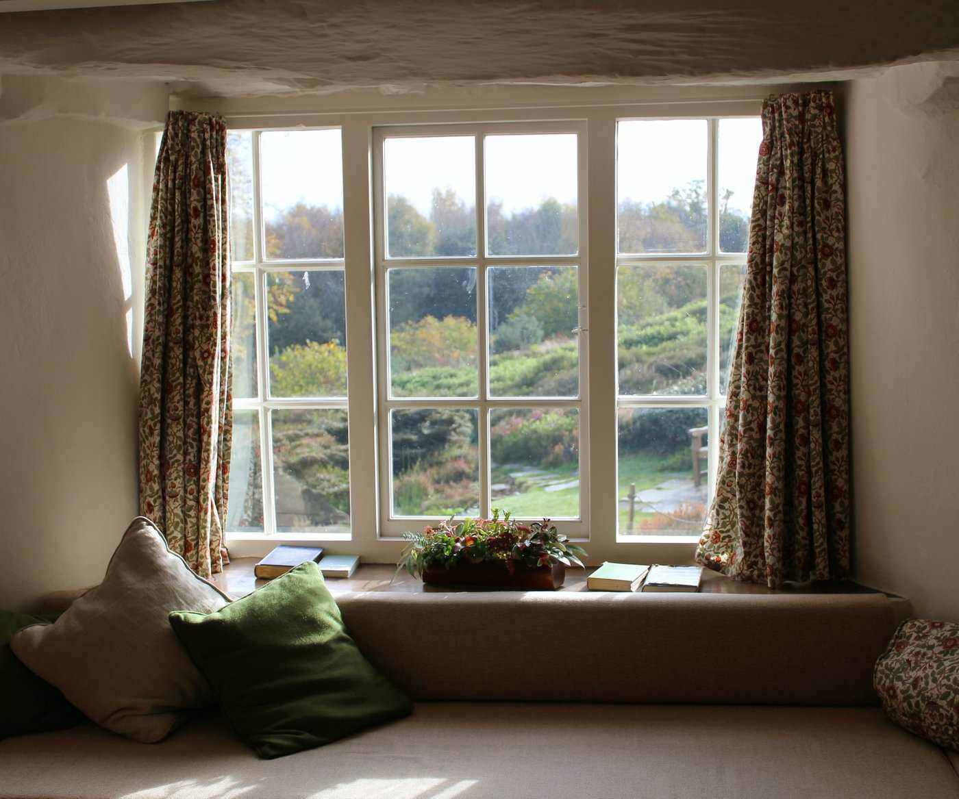 window looking onto green countryside - small changes to make your home energy efficient