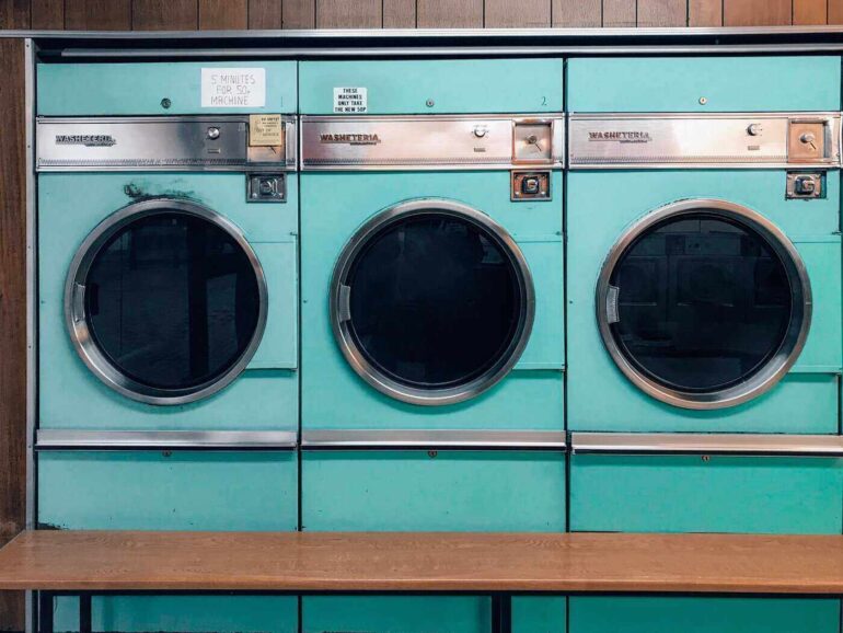 row of washing machines - 5 things that might shorten the life of your washing machine