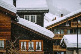 snow covered roofs - top 5 environmentally friendly roofing materials