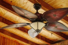 wooden ceiling fan against wooden ceiling - how to choose the right eco-friendly ceiling fan for your home
