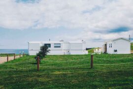 mobile home by seaside - the pros and cons of buying a mobile home