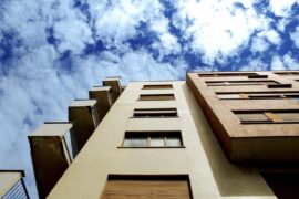 bottom up view of apartment buildings - how apartments are becoming more sustainable