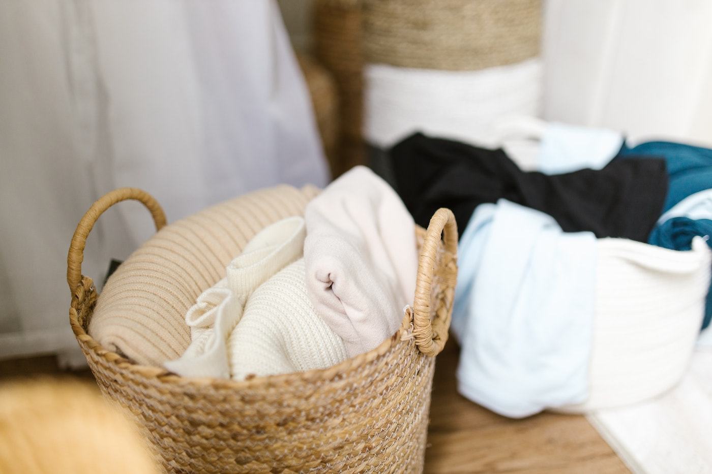 laundry in baskets - tips for making your wardrobe more sustainable